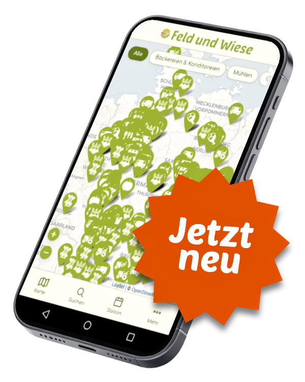 Die Feld-und-Wiese-App auf einem Smartphone: die Regiokarte mit vielen grünen Betriebs-Markern in Deutschland.
